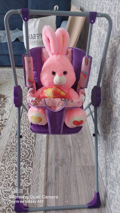 Детская качеля с шезлонгом.