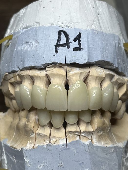 Зубной техник