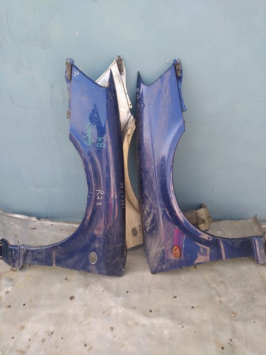 Крылья Subaru legacy B4