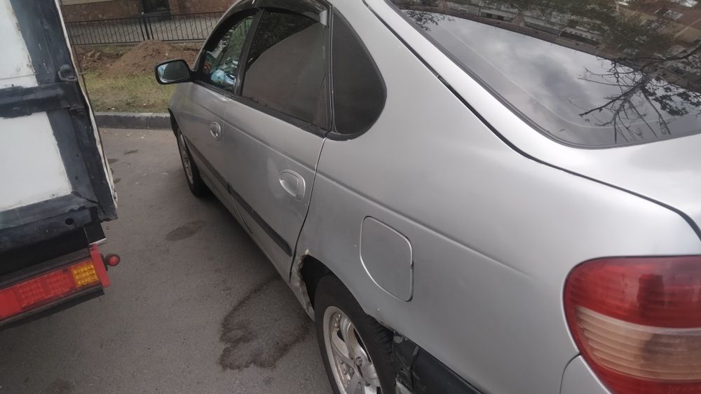 Автомобиль Тойота Авенсис