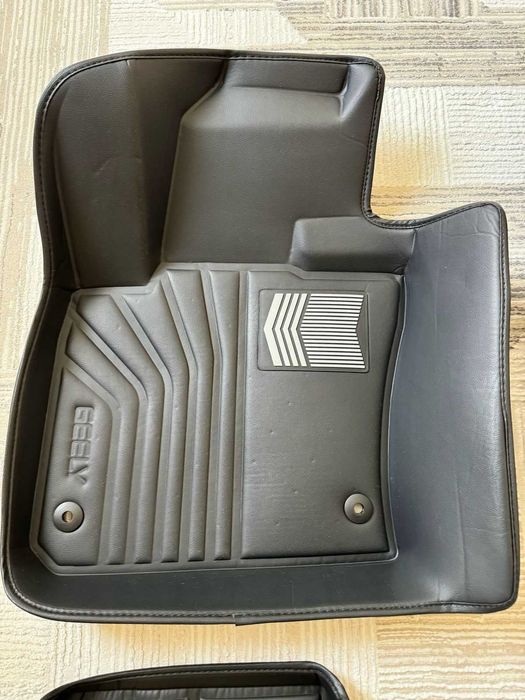 3D коврики в салон Geely Monjaro