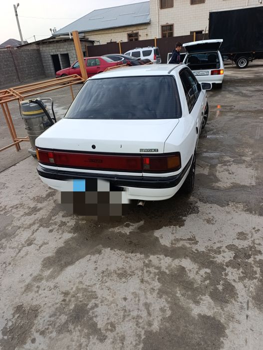 Mazda 323 норм сос