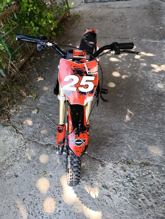 Motocicleta electrica copii Eco Tiger 1000W pentru copii 6-12 ani, 36V, roti 12/10, culoare portocalie, ideala pentru aventuri off-road