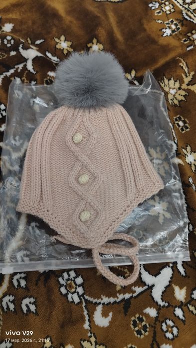 Продам детские шапочки новые