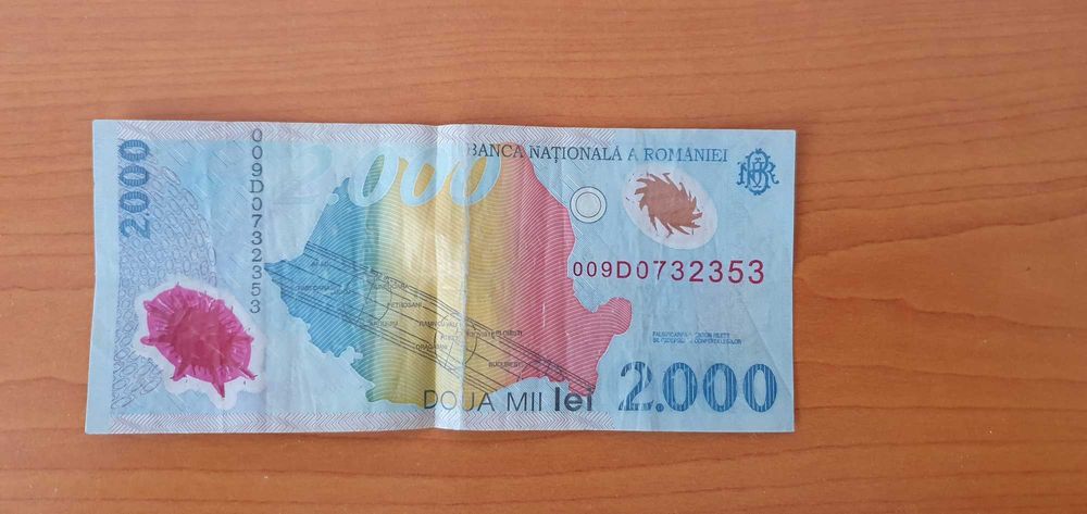 Bancnota 2000 lei cu eclipsa soare