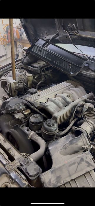 Двигатель м52б25