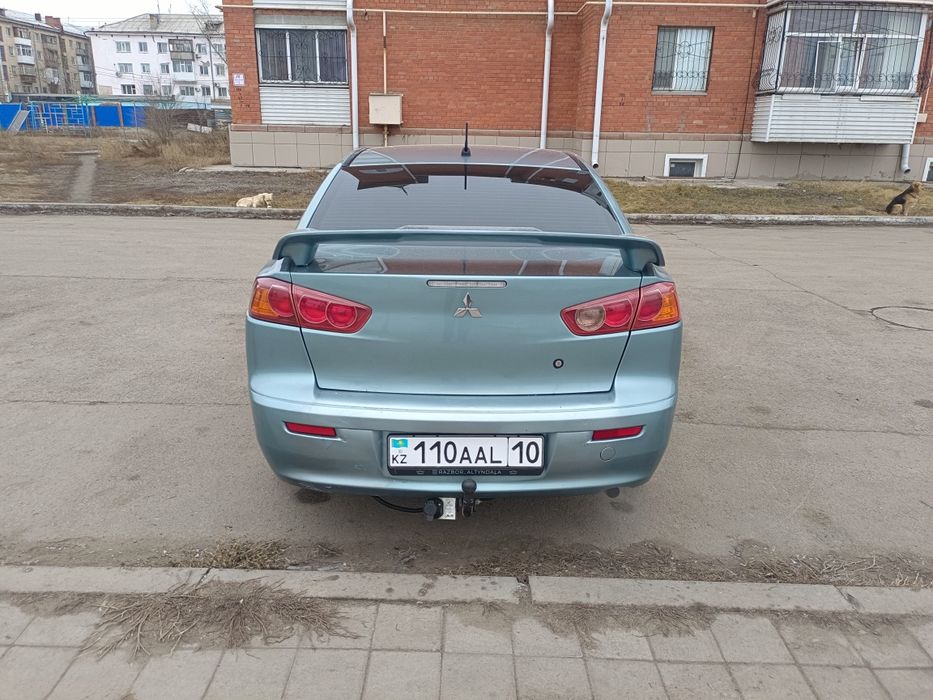 Митсубиси Лансер Х