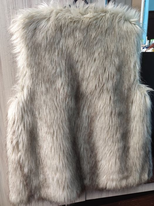 Дамски пухен елек