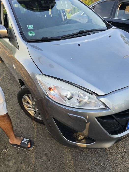 Mazda 5 cu dauna minora masina este din Germania