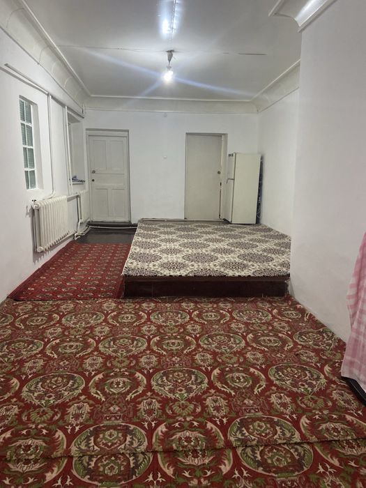 Двухэтажный дом с пристройкой