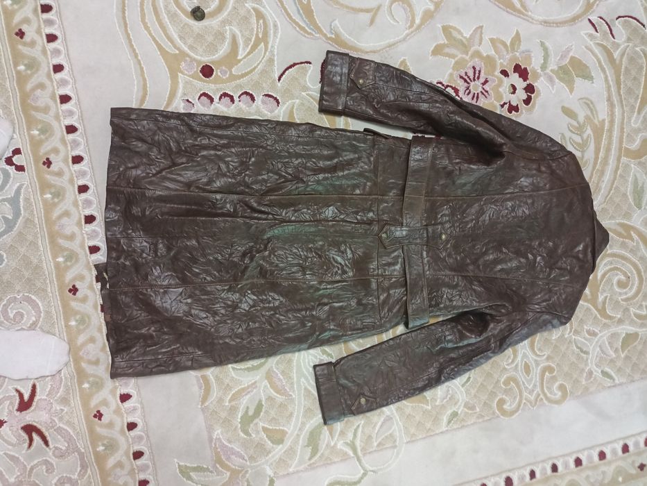 Кожанный плащь 44 р. Новый.