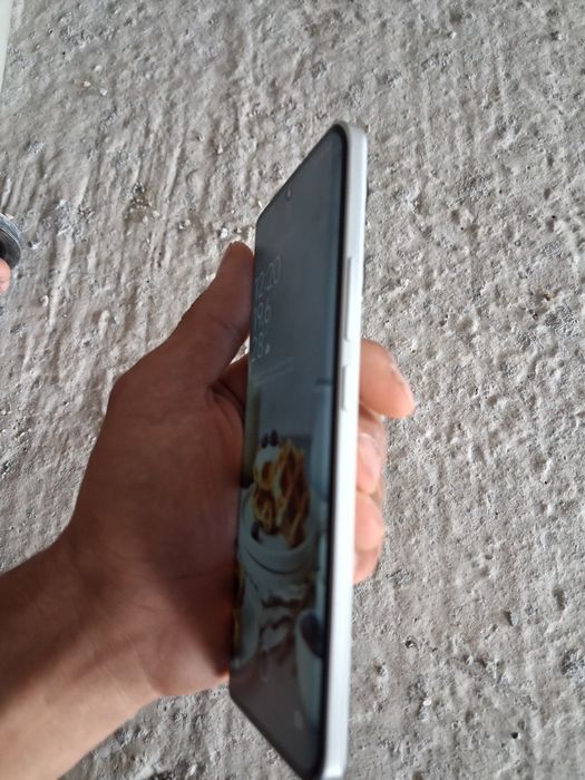Xiaomi HyperOS ..