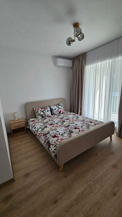 Apartment 2 camere de inchiriat! 10 min metrou. Parcare acoperita. 71mp. 2 balcoane. Bloc nou. Etaj 1