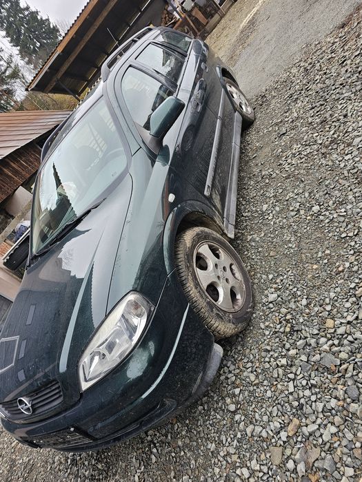 -Vând opel astra