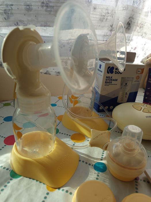 Двойна електрическа помпа за кърма Medela Swing Maxi