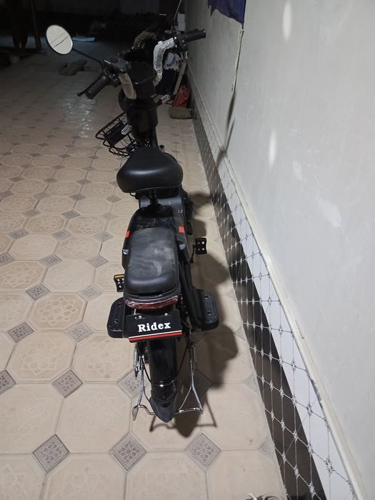 Скутер идеал холатта