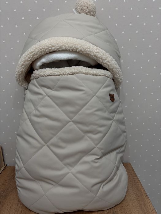 Продам теплый конверт с комбинезоном