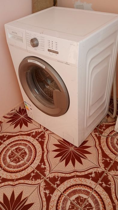 Mașină de spălat
