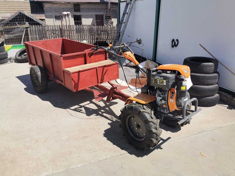Motocultor O'MAC MC 12000E-D echipat cu remorca foarte incapatoare cu frana de picior