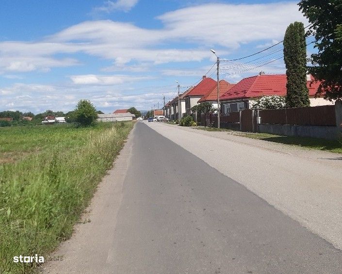 Vand teren construibil intravilan utilitati drum asfaltat central