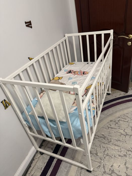 Кровать детская на колесах