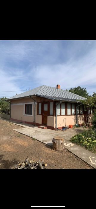 Casa 3camere , baie, veranda inchisa, teren 1500mp,magazie, vie,pomi ...