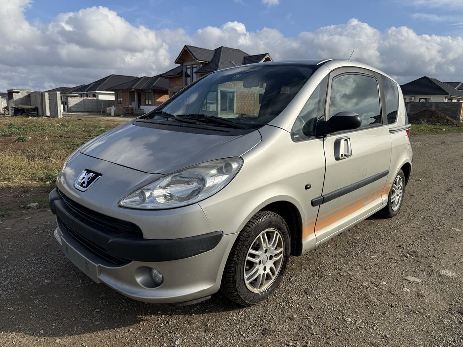 Peugeot 1007 • Diesel 1.4 • Usi automate
