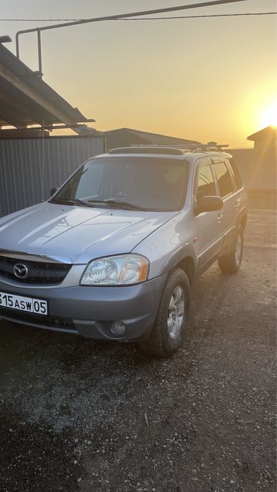 Мазда трибьют 3 литра