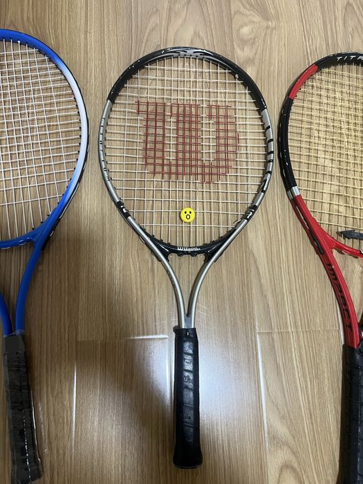 Теннисная ракетка