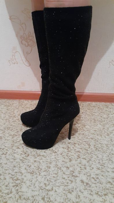 Продам Женские  сапоги