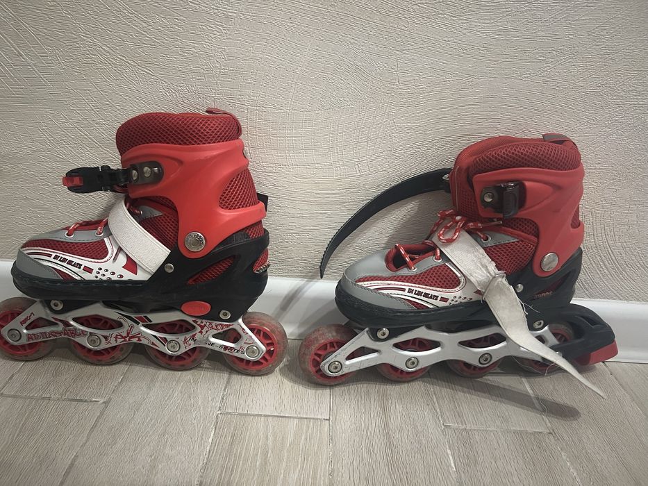 Роликовые коньки