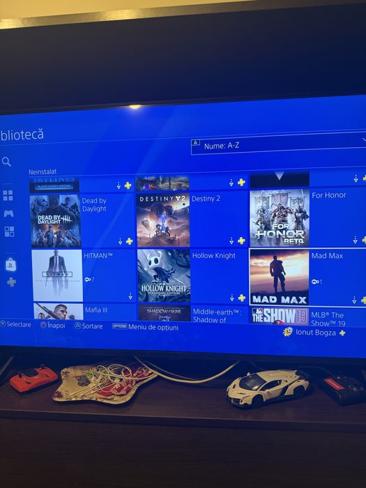 Vand consola ps4 pro + 44 jocuri + 3 controlere