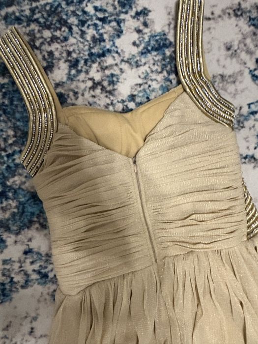 Продаю платье блестящее