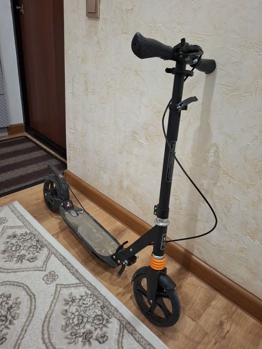 Продам черный самокат