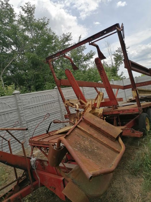 remorca automata incarcare si descarcare baloti NEW HOLLAND 1006