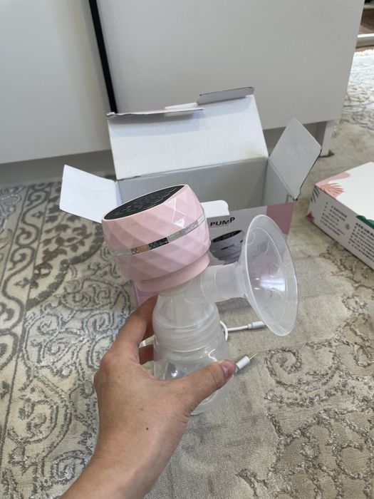 Электрический молокоотсос