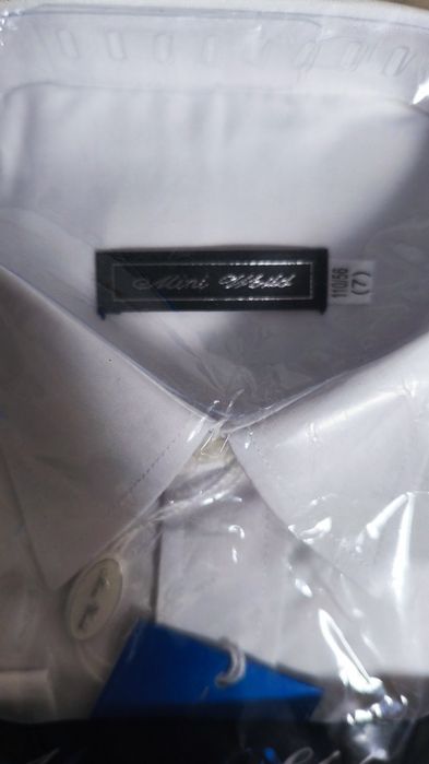 Продам белые рубашки 100 -110 см.