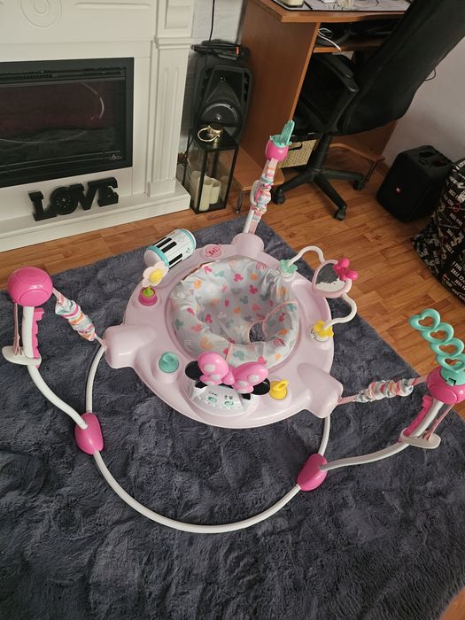 Premergator Disney Baby MINNIE MOUSE, Bright Starts, cu lumini si melodii, pentru copii de la 6 luni