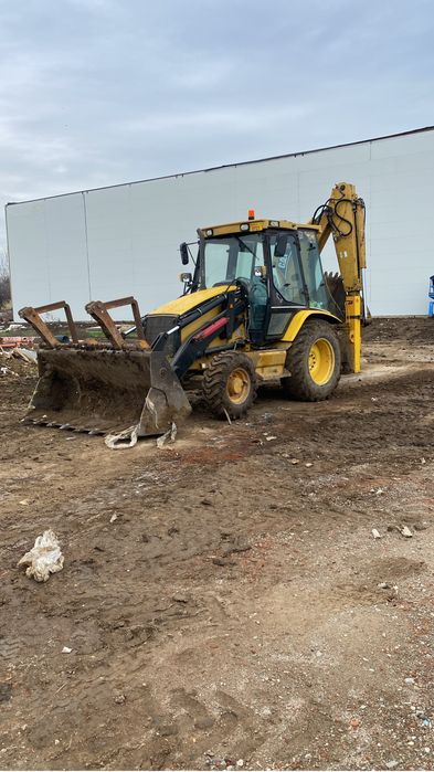 Inchiriez buldoexcavator CAT 428D