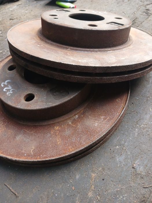 Тормозной диск Мазда 323