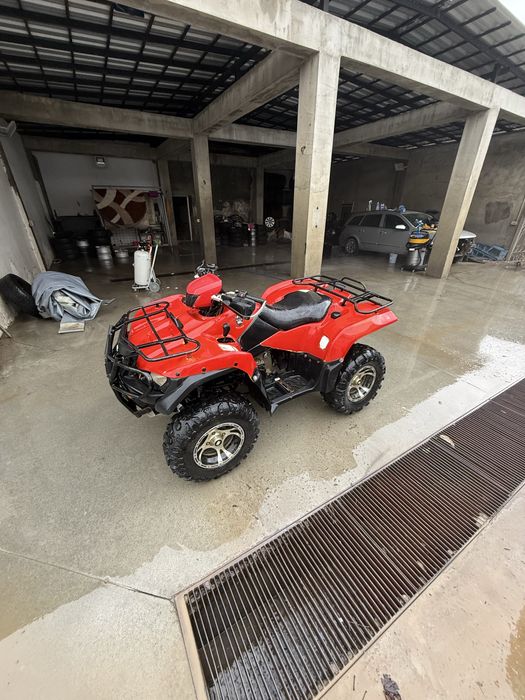 Vând Suzuki king quad