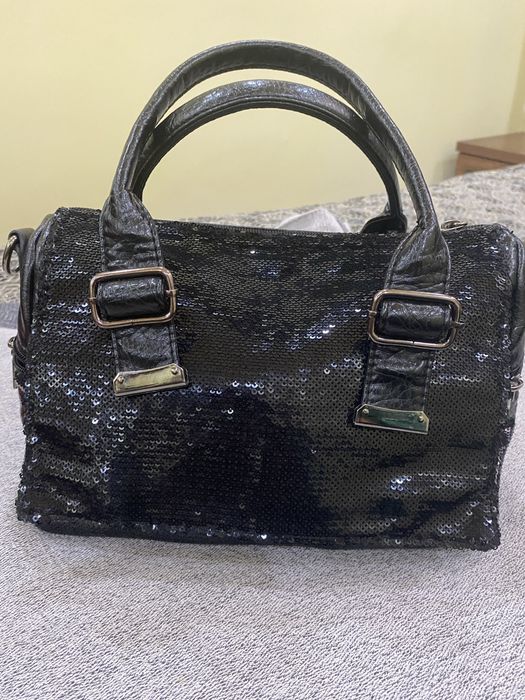 Аеллар сумкаси кора рангда холати яхши