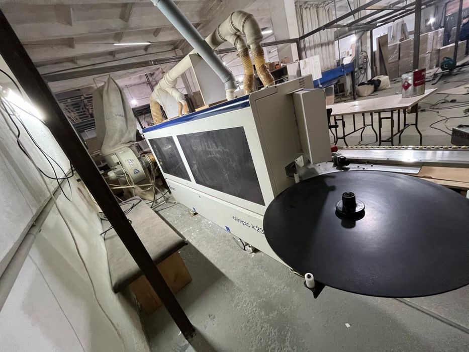 Кромкооблицовочный станок scm