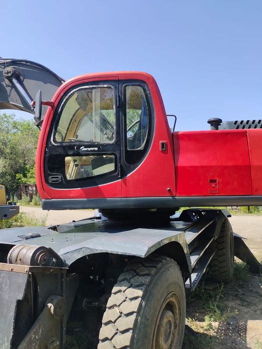 Продам колесный экскаватор