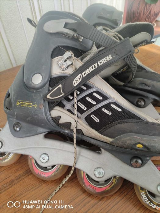 Коньки роликовые