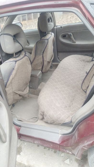 Машина Mazda кронс