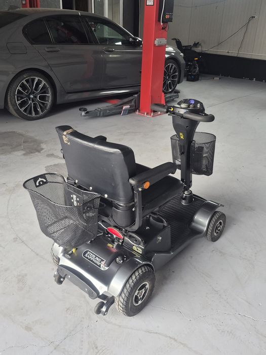 Carucior scuter electric pentru persoane cu  dezabilitari sau batrîni