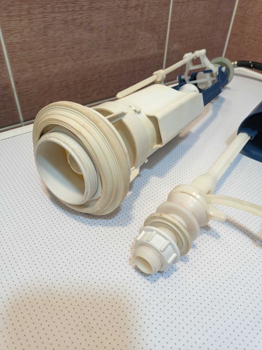 Механизм для бачка унитаза.