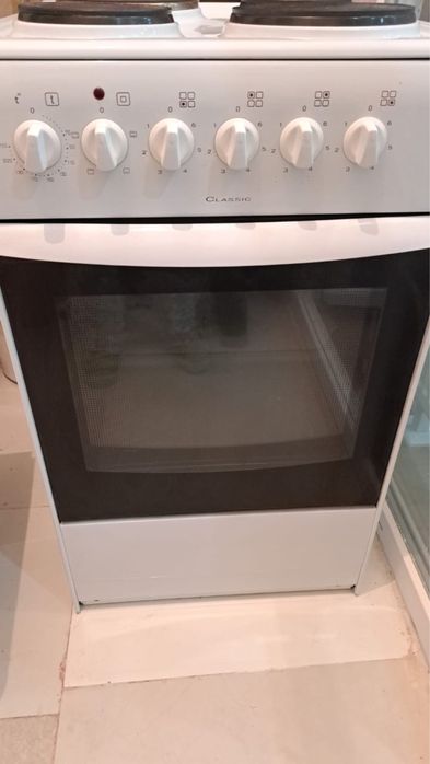 Электроплита с духовкой