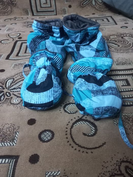 Продам комбинезоны новые